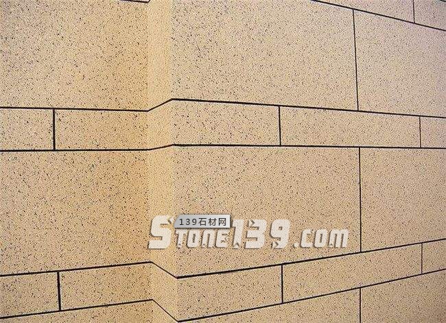 外墻裝飾選石材干掛還是真石漆？